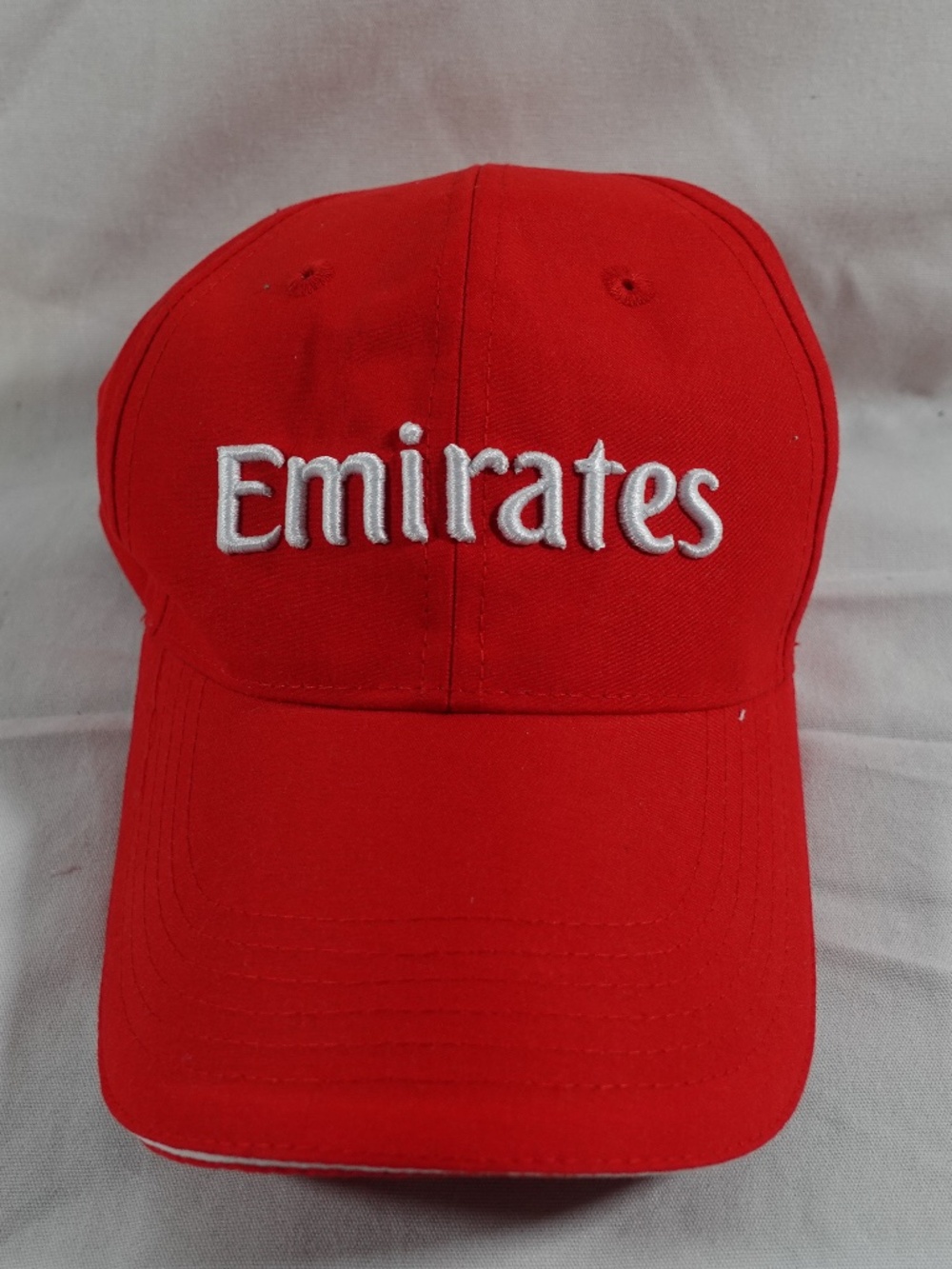 Official Emirates Airlines red baseball cap. Features really nice 3D embroidery